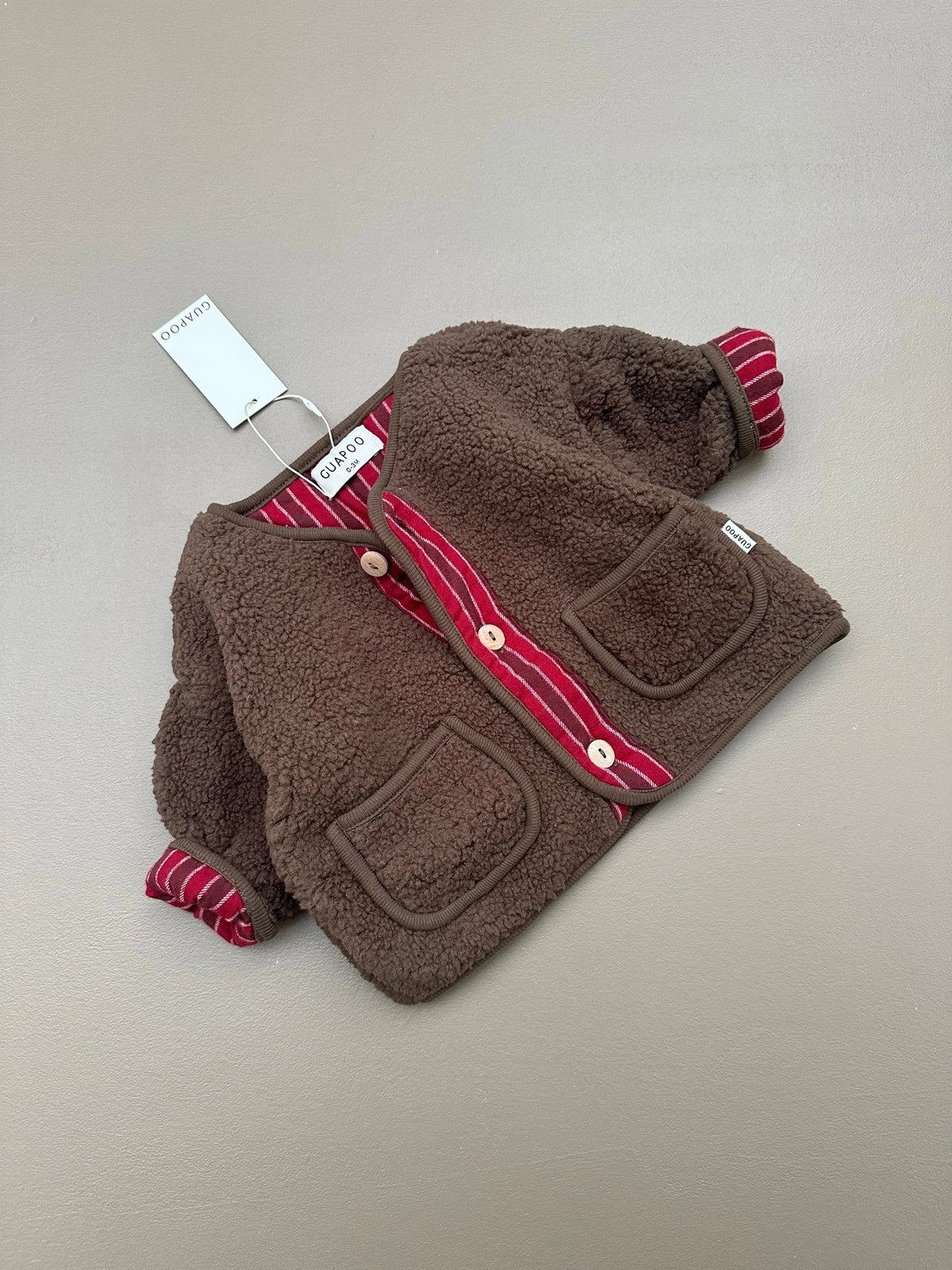 REVERSIBLE TEDDY JACKET RED STRIPES