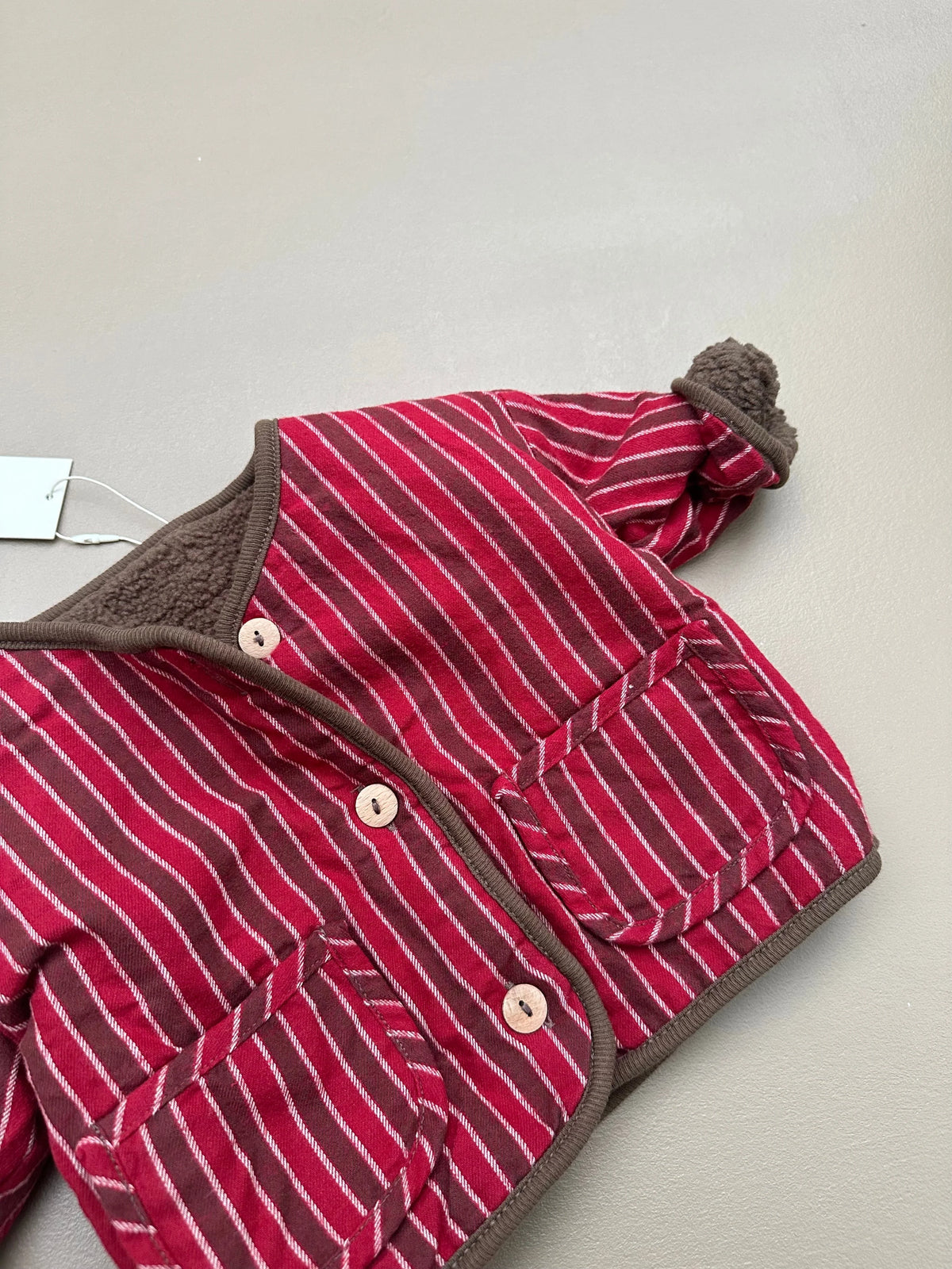 REVERSIBLE TEDDY JACKET RED STRIPES